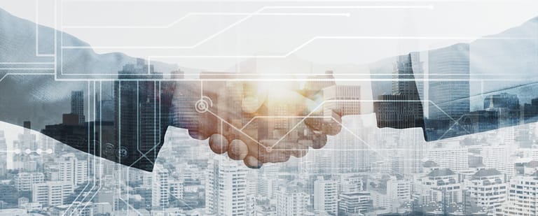business-partners-handshake-global-corporate-with-technology-concept